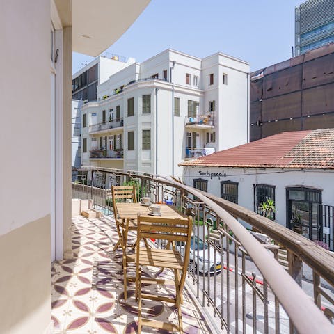 People-watch from your beautifully tiled balcony, with a bustling street view