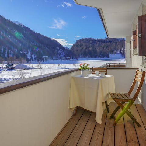 Admire the Alpine scenery from the balcony