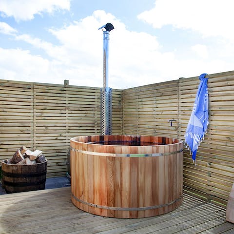 Sink into the wood-fired hot tub for a soak under the stars