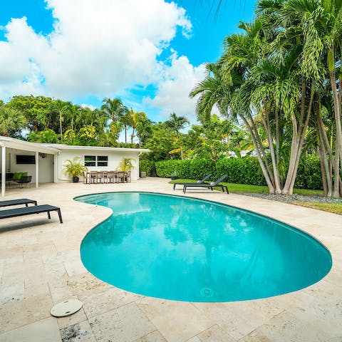 Plunge into the kidney-shaped pool to cool off from the Florida heat