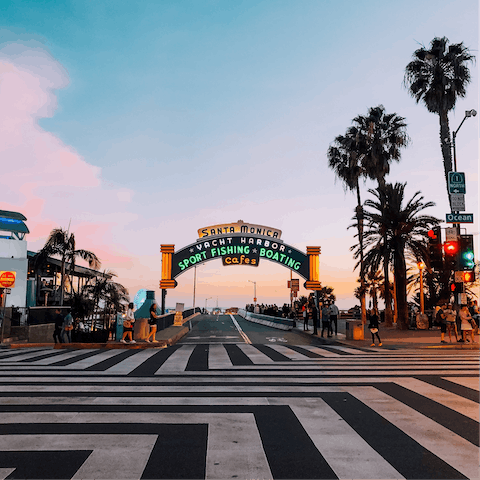 Ride fifteen minutes east to visit Santa Monica Pier