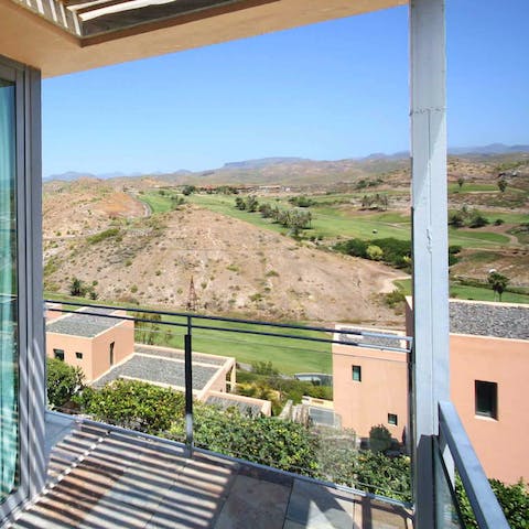 Take in the views of the golf course from your private balcony