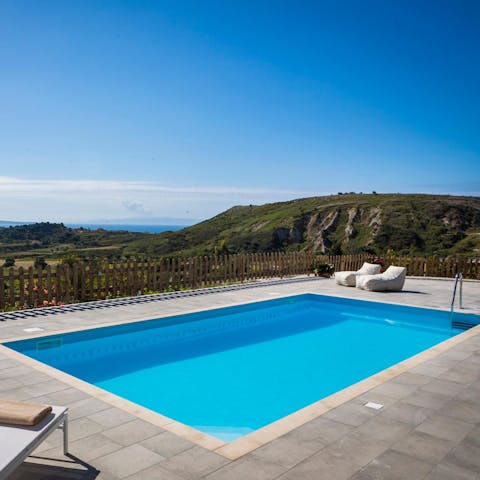 Take a leisurely swim while soaking up views of the rugged landscape