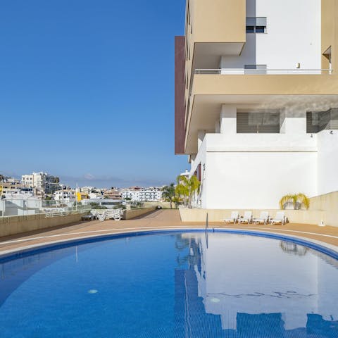 Cool off from the Lagos heat in the communal pool