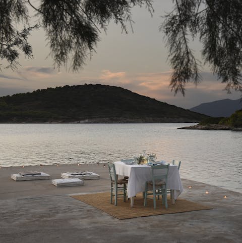 Enjoy a romantic dinner as you overlook the water and rolling hills of the island