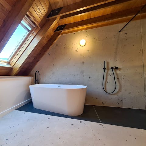 Take a luxurious soak in the beautiful freestanding tub