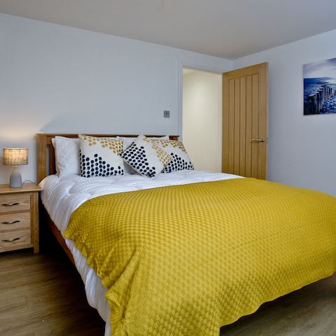 Snuggle up in the sumptuous beds after a busy day by the sea