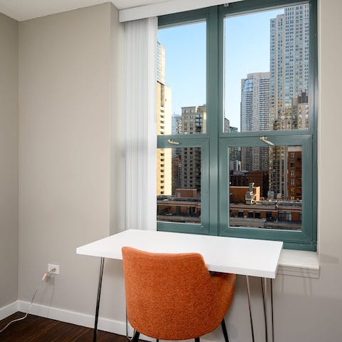 Work remotely while overlooking Chicago's skyline
