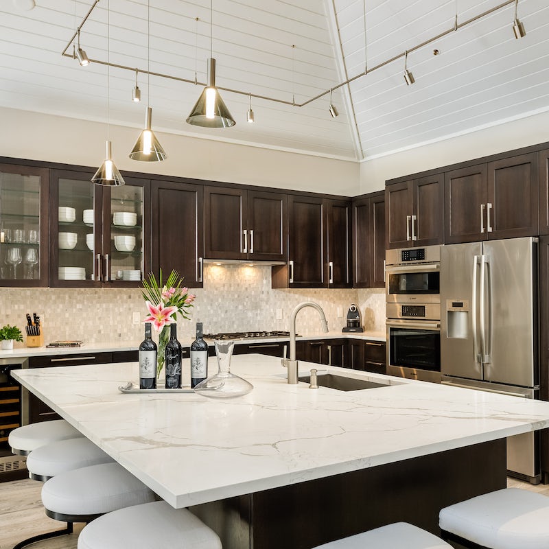 Unwind with drinks and cook feasts with ease in the sleek kitchen