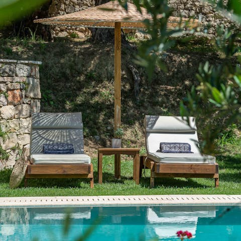 Recline on a lounger or cool off with a swim in your private pool