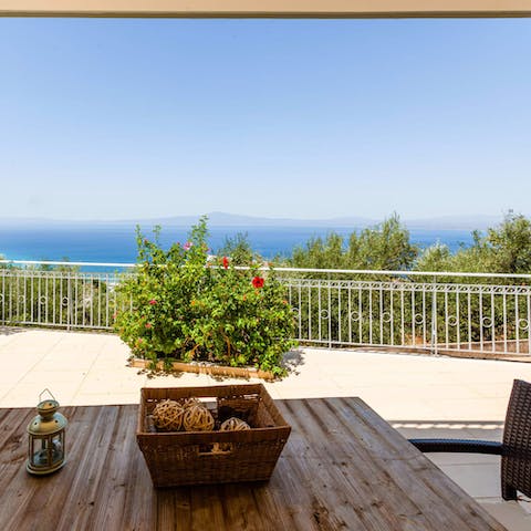 Pour a glass of wine and watch the sun dip into the ocean from your private patio area