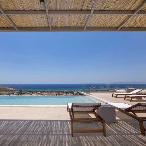 Lie back by the infinity pool or go for a swim with gorgeous sea views