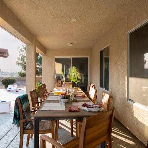 Gather around the outdoor table for an alfresco dinner, fresh from the grill