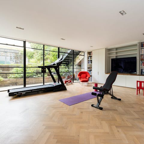 Enjoy a workout or gather for a movie night in the playroom