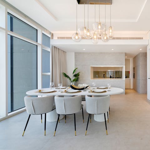 Tuck into your favourite home-cooked meals around the stylish dining set