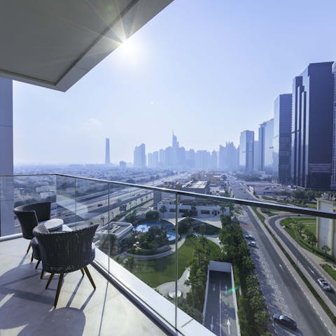 Admire the Dubai cityscape from the peaceful and private balcony