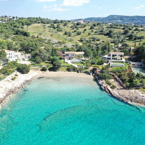 Enjoy direct access to a sandy beach on a sheltered cove, ideal for watersports