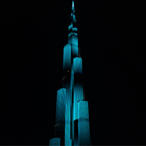 Admire the neon Burj Khalifa at night, a twenty-five-minute drive