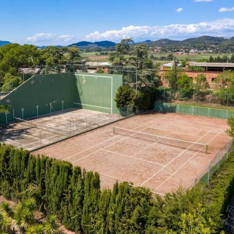 Play tennis, pelota or volleyball on the villa's private courts