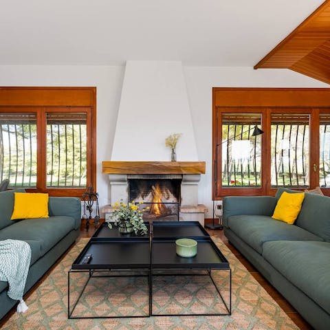 Get toasty and warm next to the open fireplace in the living room