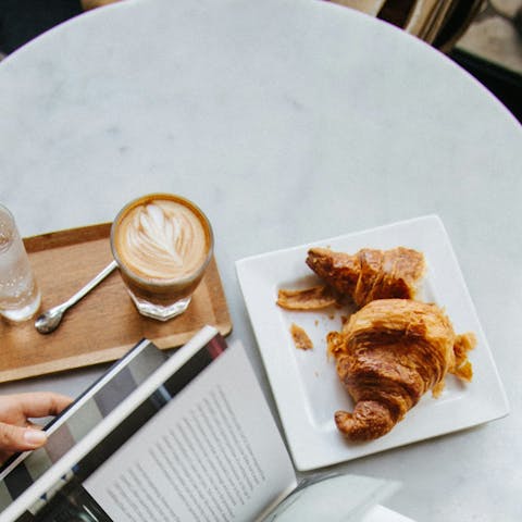 Enjoy a morning coffee and croissant in a local cafe