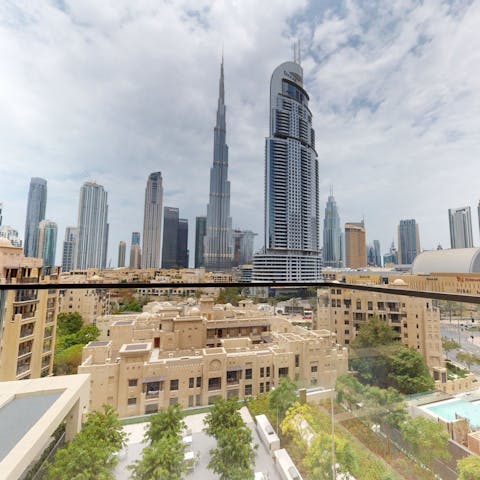 Take in dramatic views of the Burj Khalifa from your balcony