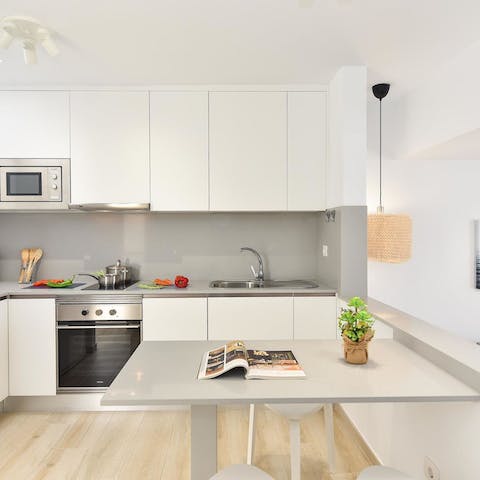 Sit down for a breakfast of fruit and yoghurt in the sleek dining area