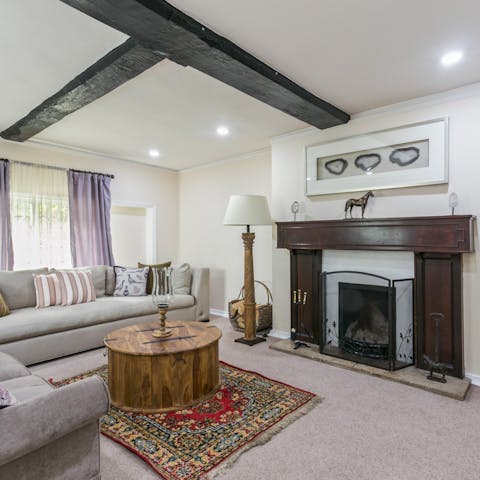 Appreciate this historic home's period features and open fireplace