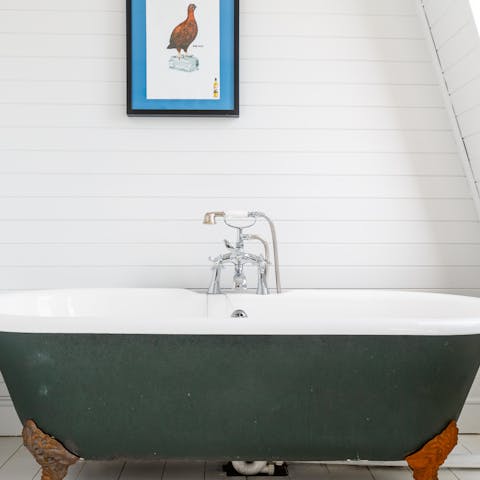 Enjoy a long soak in the swanky freestanding bathtub