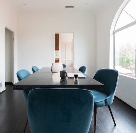The teal blue dining chairs
