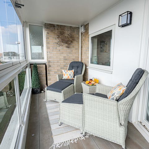 Sip your morning cup of tea on the balcony overlooking the waves