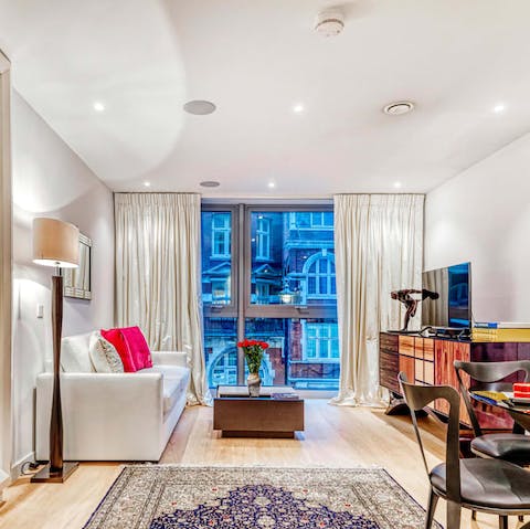 Take in Westminster views from the stylish living room