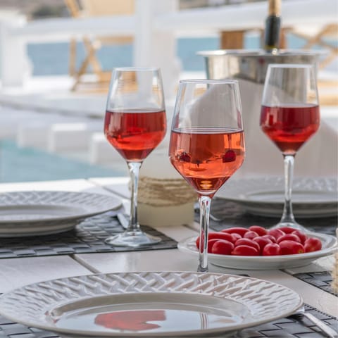 Sip chilled rosé under the blazing Grecian sun