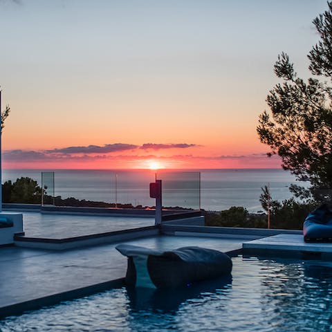 Admire the sunset from the pool area