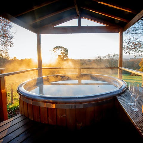 Slip into the hot tub and enjoy the view as you soak your troubles away