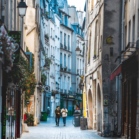 Explore Le Marais with its fashionable boutiques and restaurants