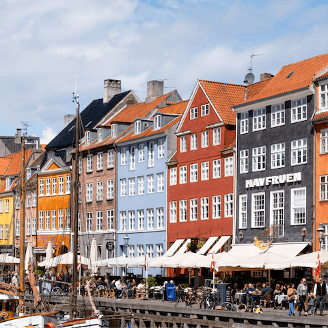 Follow the bustle down to Nyhavn Harbour, within easy walking distance