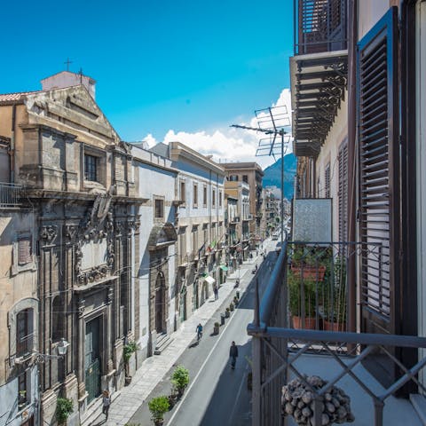 Step out onto the wrough-iron balcony and admire your historic Palermo street