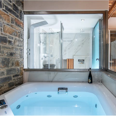 Treat yourself to a long, hot soak in the Jacuzzi tub