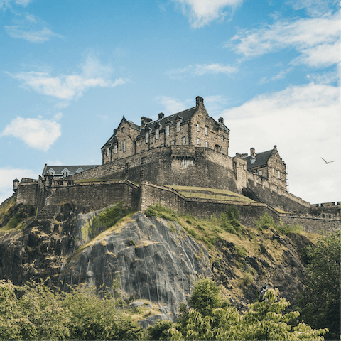 Visit the ancient Edinburgh Castle, a twenty-minute walk from your building