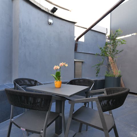 Tuck into morning coffee and pastries in the petite patio garden