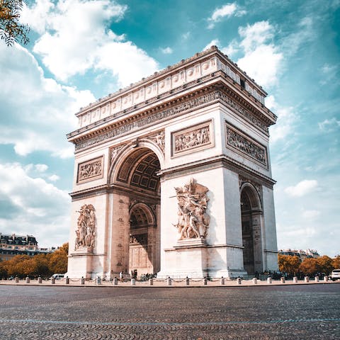 Gaze up at the Arc de Triomphe, also twenty-five minutes away on foot