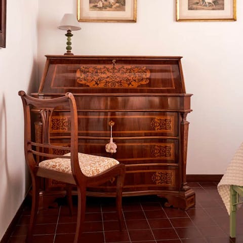 Admire classic Italian furnishings like this writer's desk