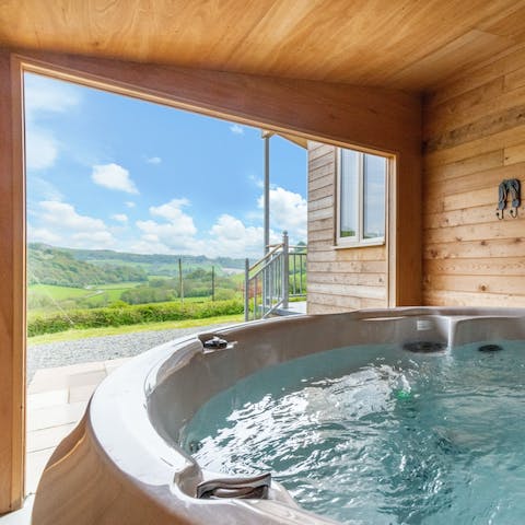 Soak up the monumental valley views from the private hot tub 