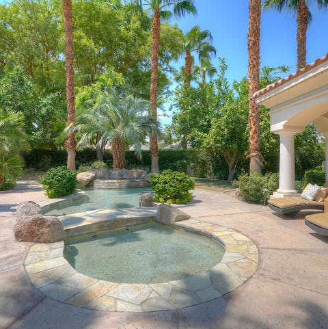 A separate pool in the Spanish Revivalist courtyard