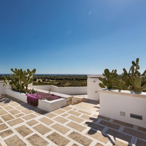 Head up to the rooftop terrace for morning yoga and expansive views