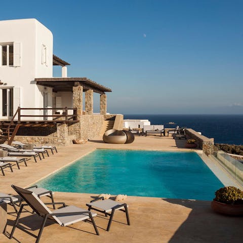 Slip into the swimmming pool with a sea view