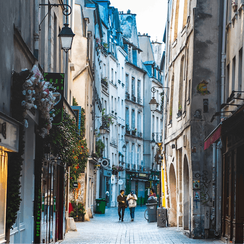 Wander the romantic streets of Le Marais, a fifteen-minute walk away