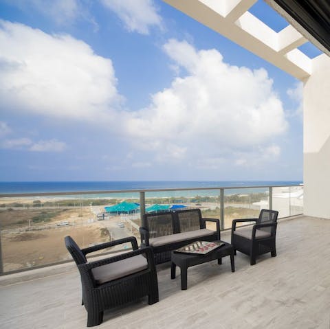 Take in sparkling Mediterranean views from the private terrace balcony 