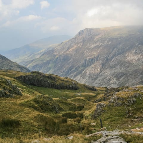 Explore the surrounding Snowdonia National Park's peaks and lakes